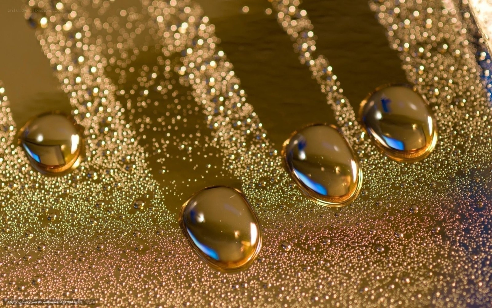 Water droplets on golden surface