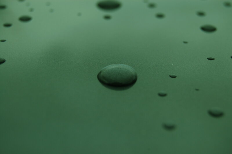 Water droplets on green surface