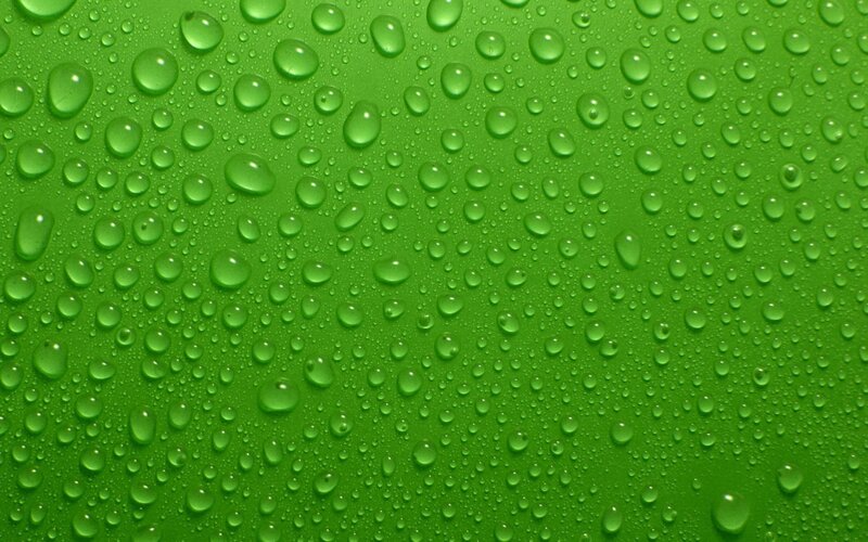 Water droplets on green surface