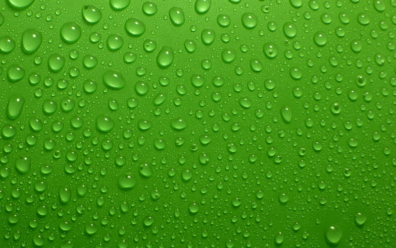 Water droplets on green surface