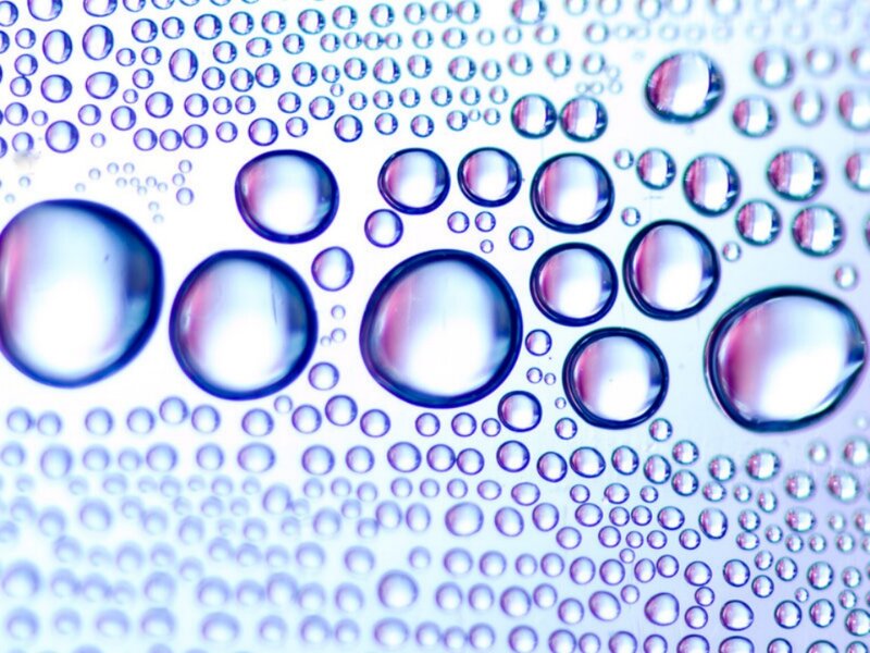 Water Droplets on Surface — Blue, Calm, Photograph, Bubbles, Reflection