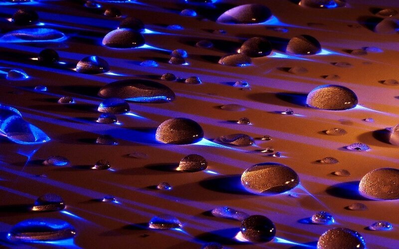 Water Droplets on Surface — Blue, Dramatic, Photograph, Drops