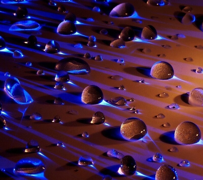 Water Droplets on Surface — Blue, Dramatic