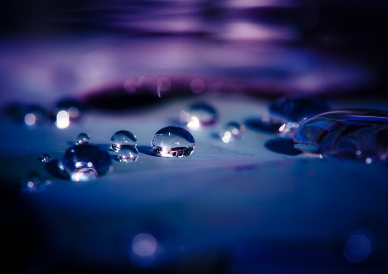 Water Droplets on Surface — Blue, Serene, Photograph, Light
