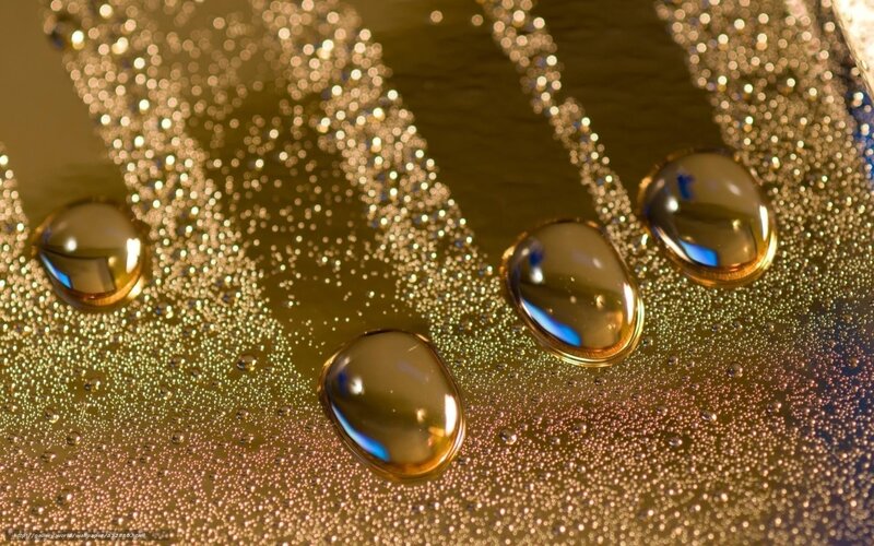 Water Droplets on Surface — Gold, Dramatic