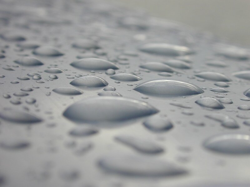 Water Droplets on Surface — Gray, Photograph