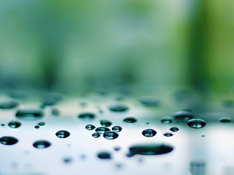 Water Droplets on Surface — Green, Calm