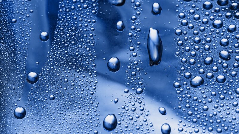 Water Droplets on Surface — Photograph, White