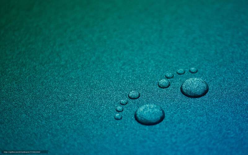 Water droplets on teal surface