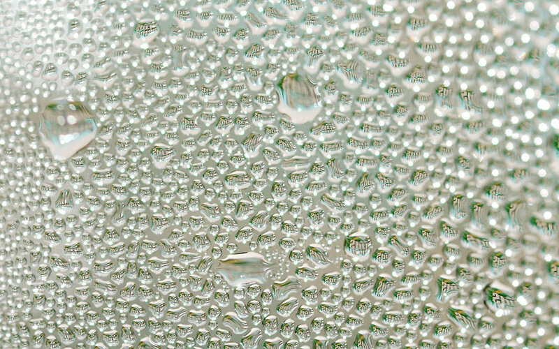 Water droplets on textured glass
