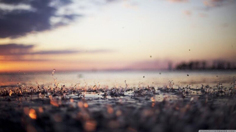 Water Droplets on Wet Sand