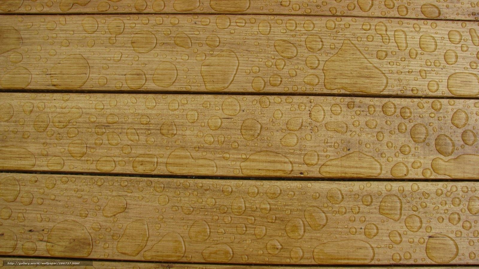 Water droplets on wooden planks
