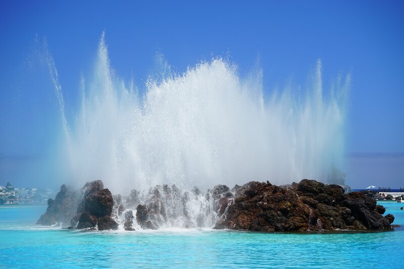 Water erupting from rocks