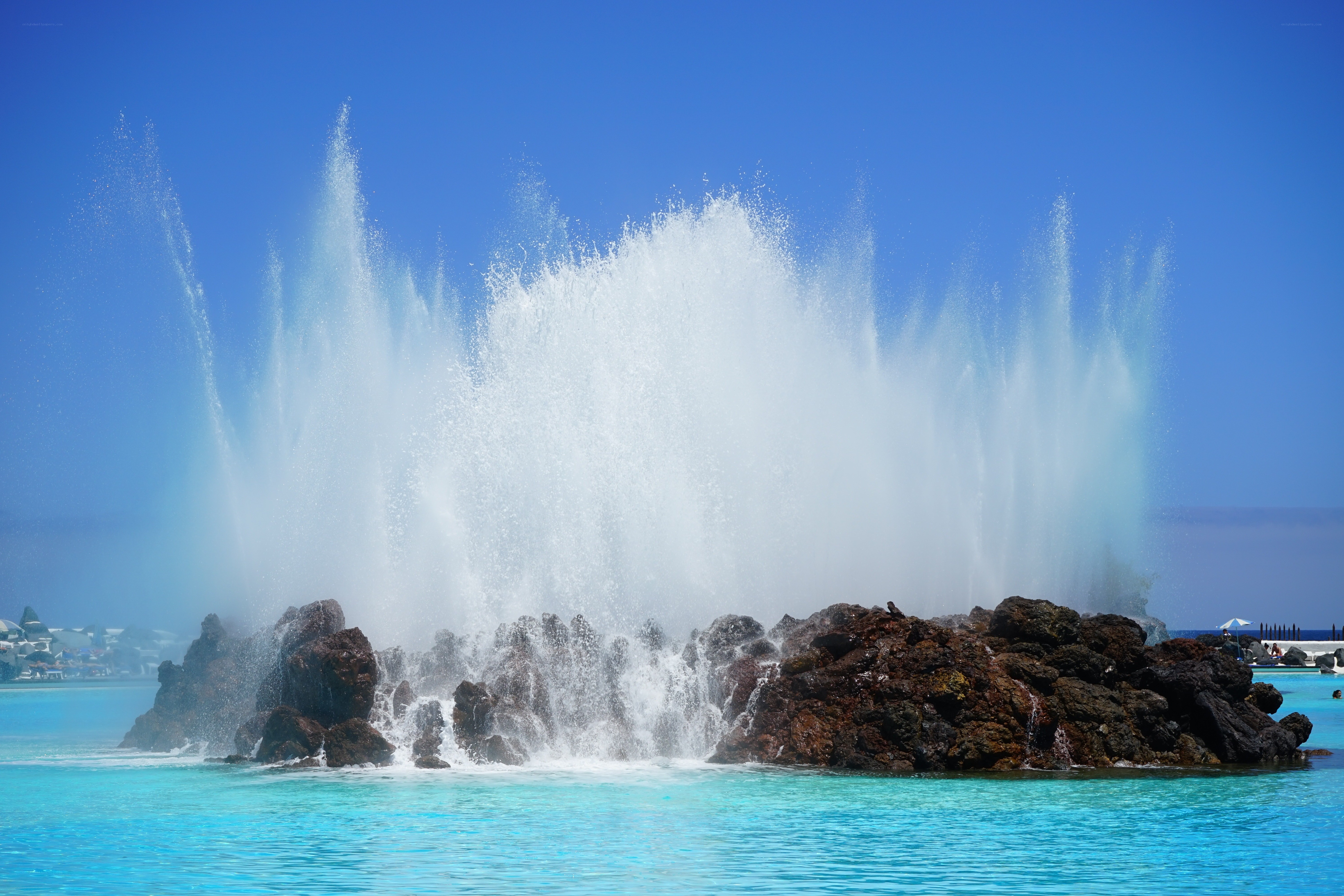Water erupting from rocks