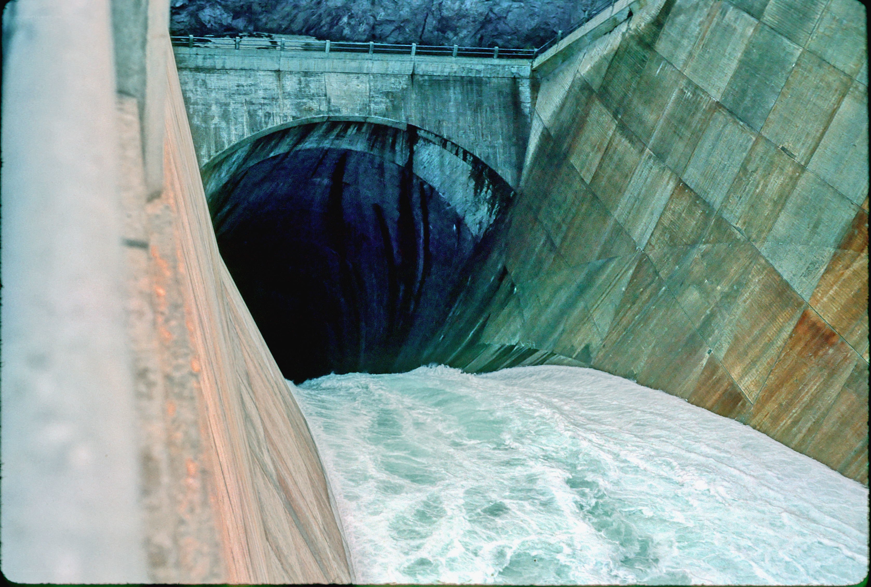 Water flowing from dam tunnel
