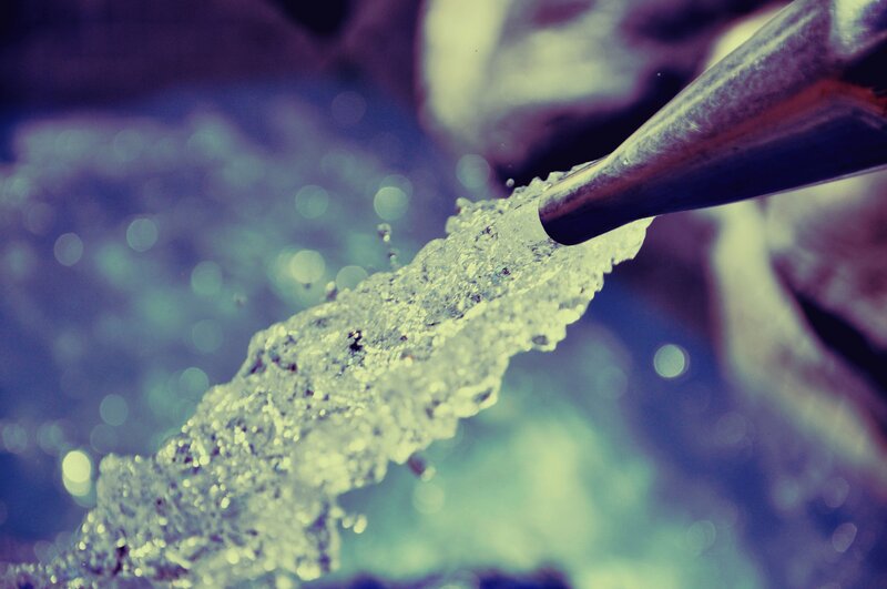 Water Flowing from Pipe — Blue
