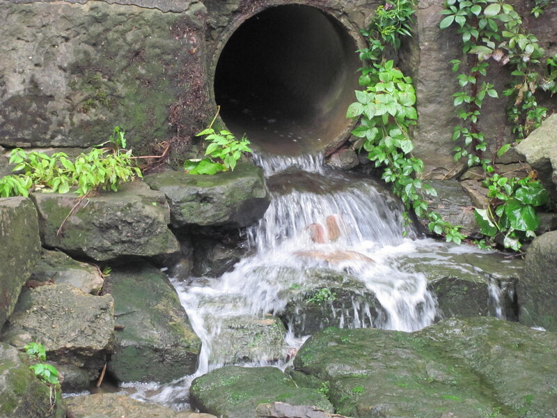 Water Flowing from Pipe — Green