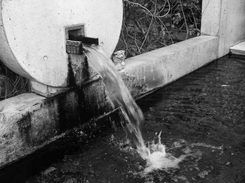 Water Flowing from Spout