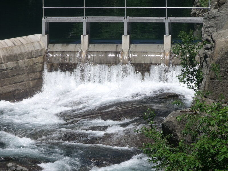 Water flowing over a dam