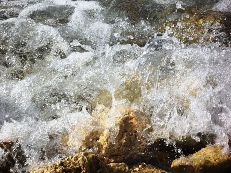 Water Flowing over Rocks — White