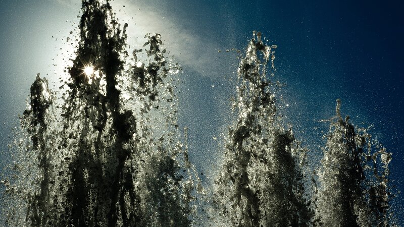 Water fountain in sunlight