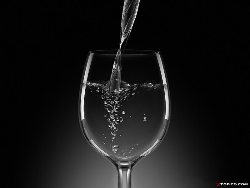Water pouring into a glass