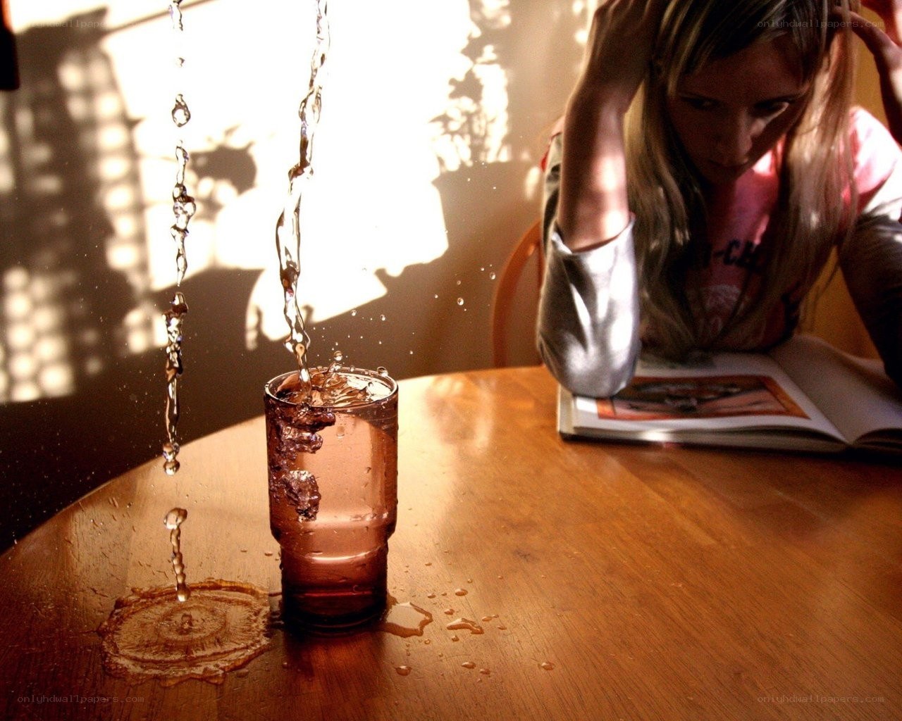 Water pouring into a glass