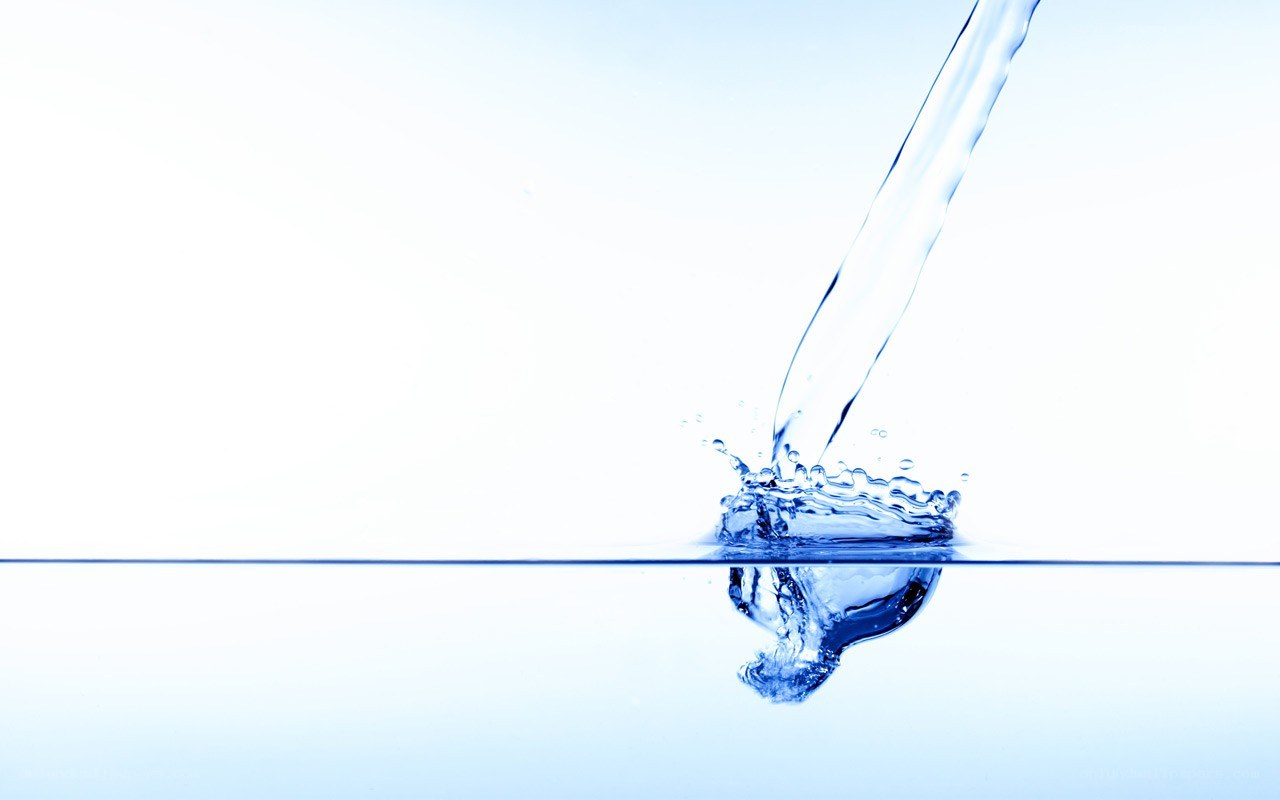 Water pouring into a pool
