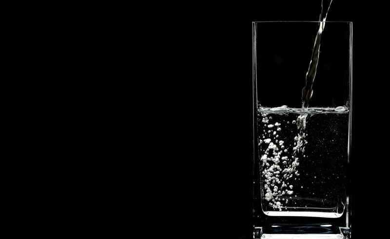 Water Pouring into Glass — Black, Dramatic, Photograph