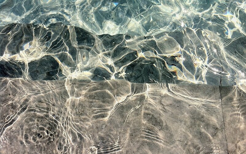Water ripples on stone surface