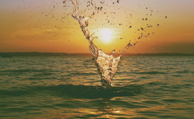 Water Splash at Sunset — Orange, Serene
