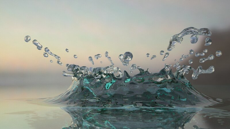 Water splash at sunset