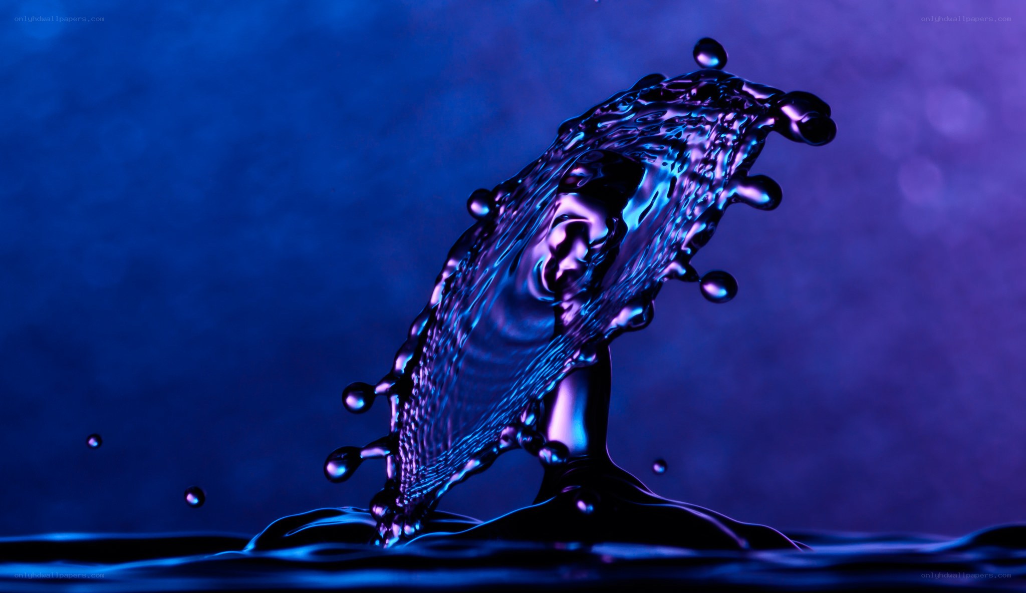 Water splash in blue light
