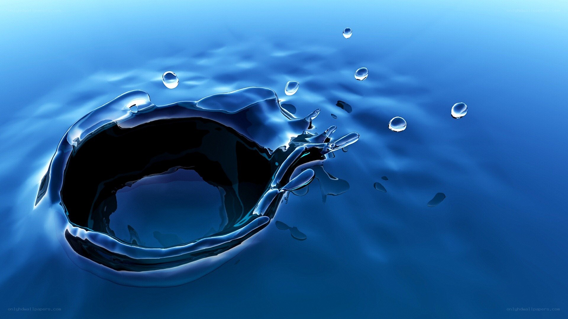 Water splash in blue liquid