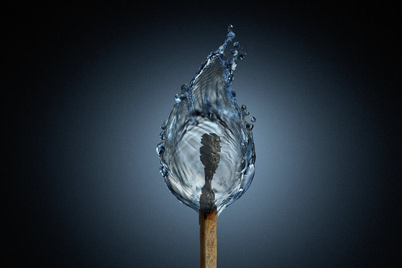 Water splash on a matchstick