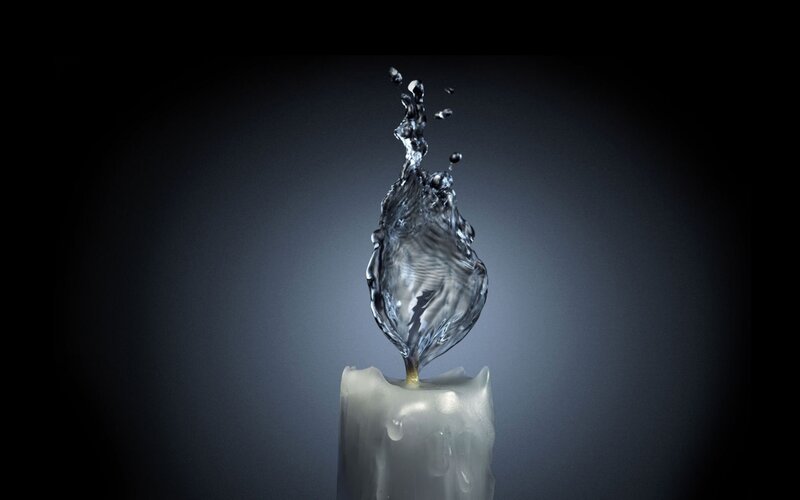 Water splash on candle flame