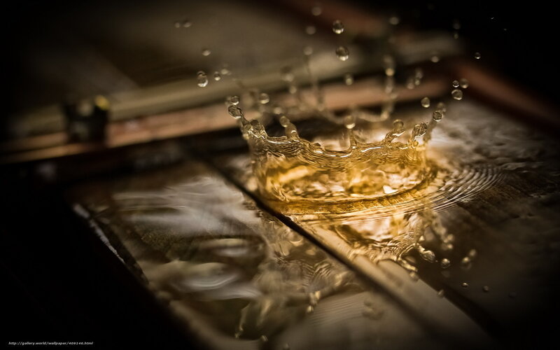Water splash on wooden surface