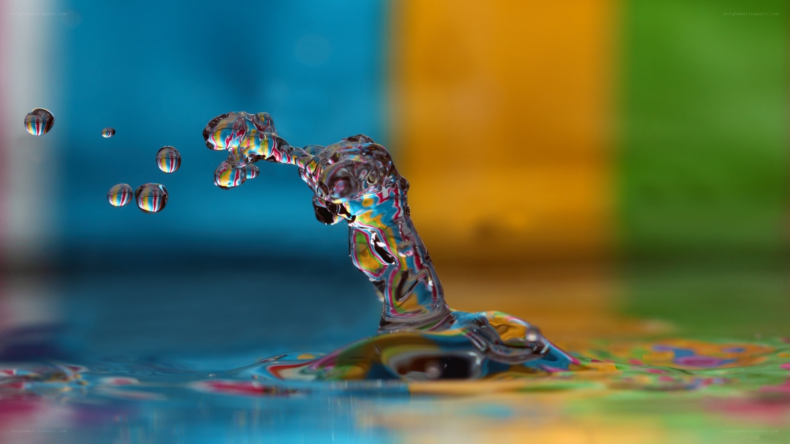 Water splash with colorful background