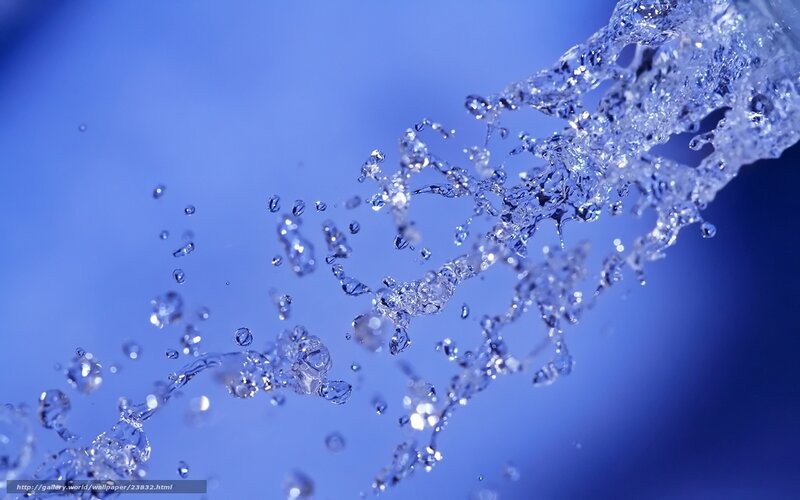 Water splashing against blue