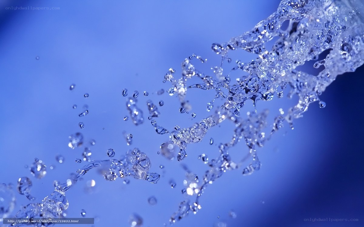 Water splashing against blue