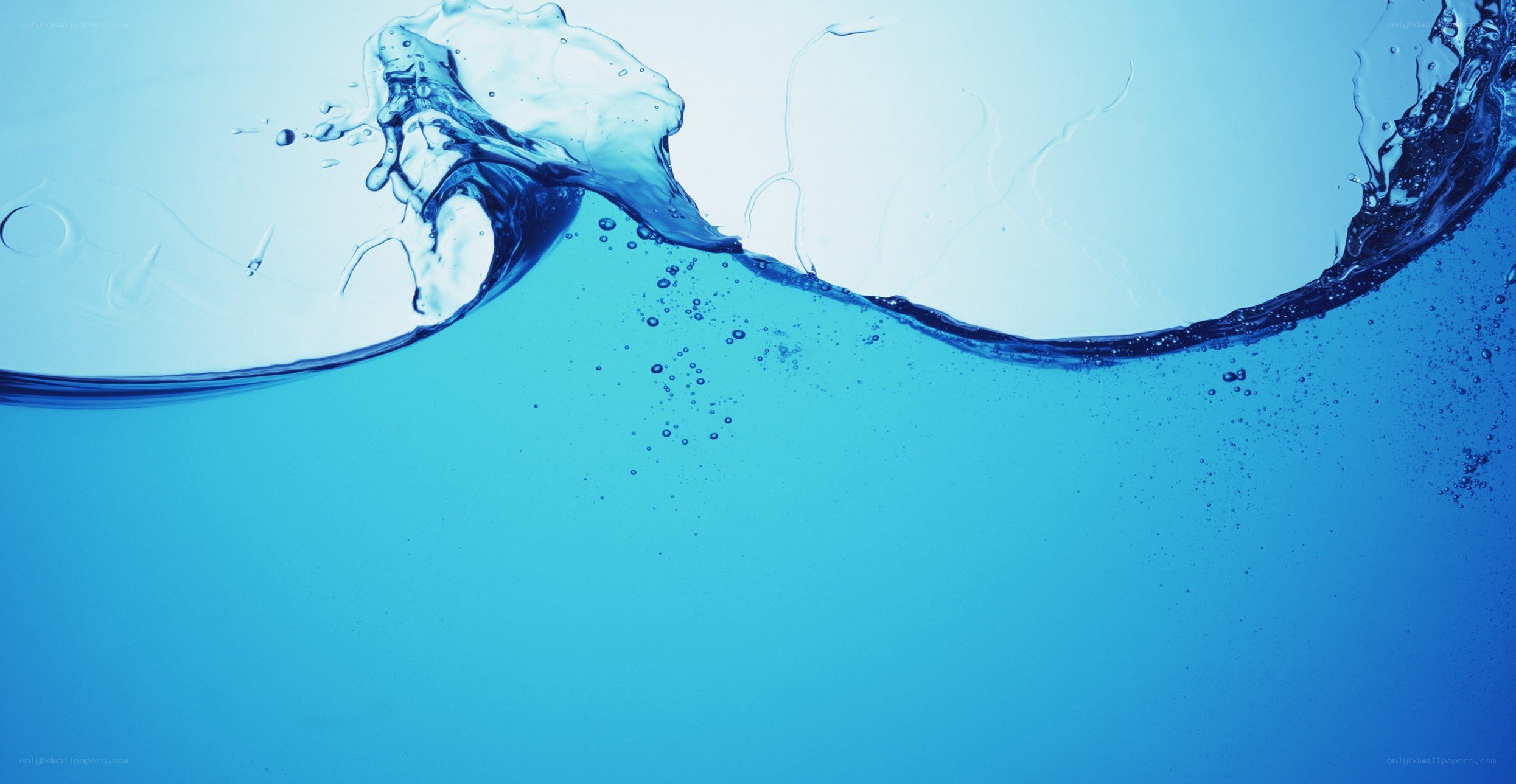 Water splashing in blue