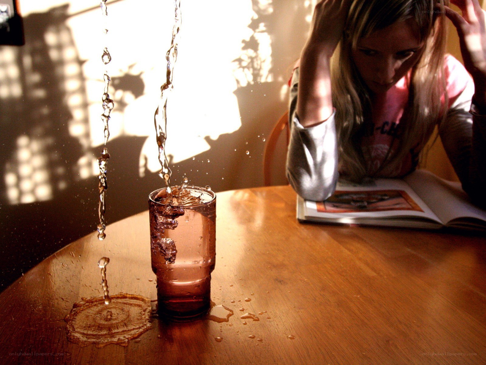 Water splashing into a glass
