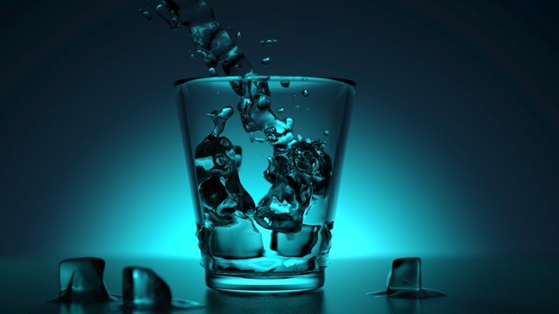 Water splashing into glass