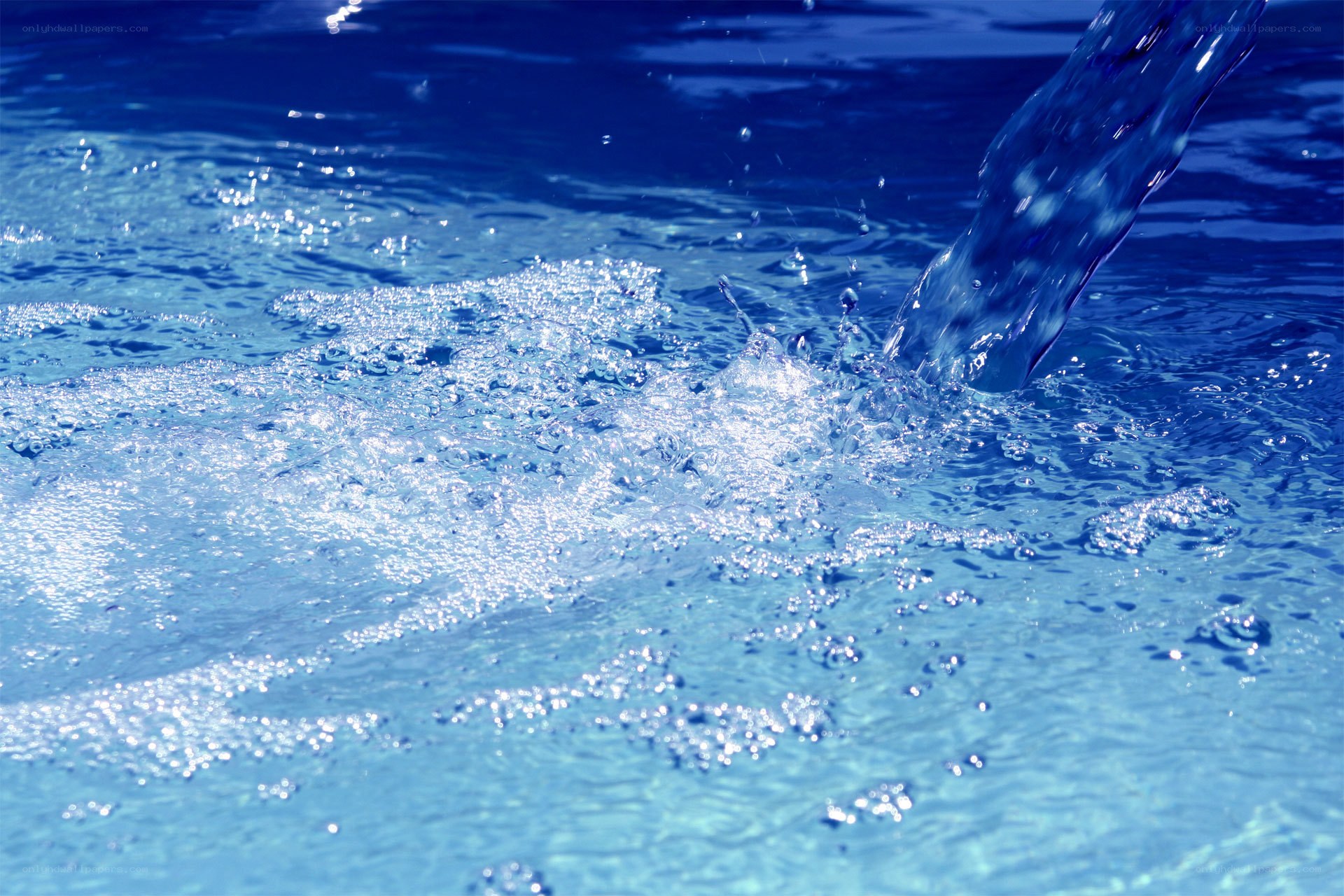 Water splashing into pool