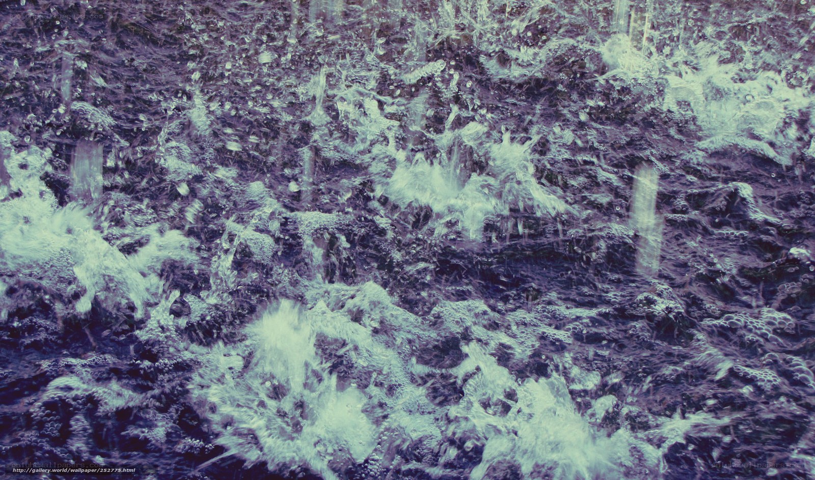 water splashing on dark surface