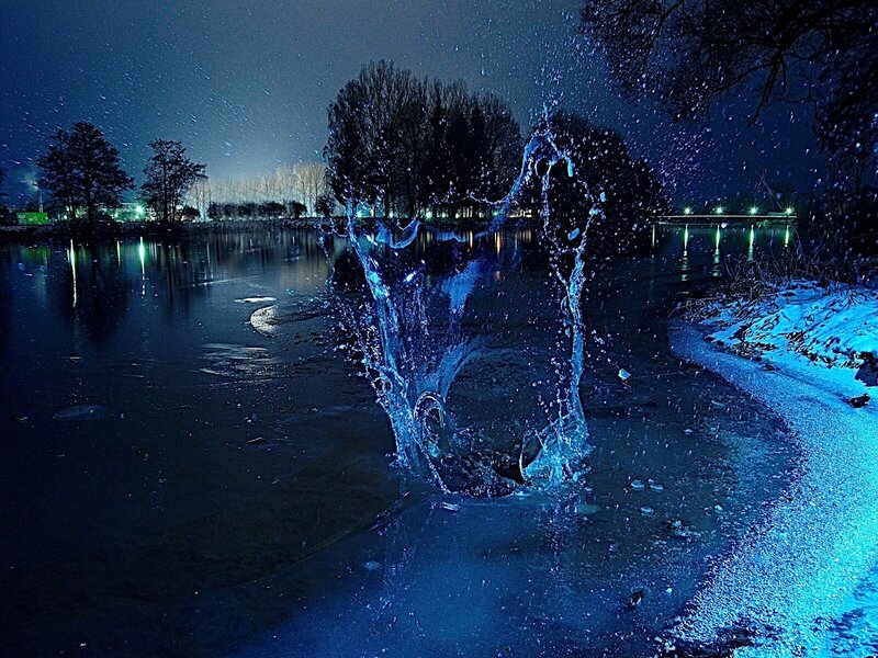Water splashing on frozen lake
