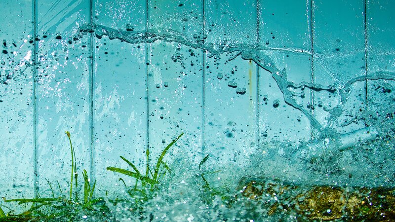 Water Splashing on Glass — Blue