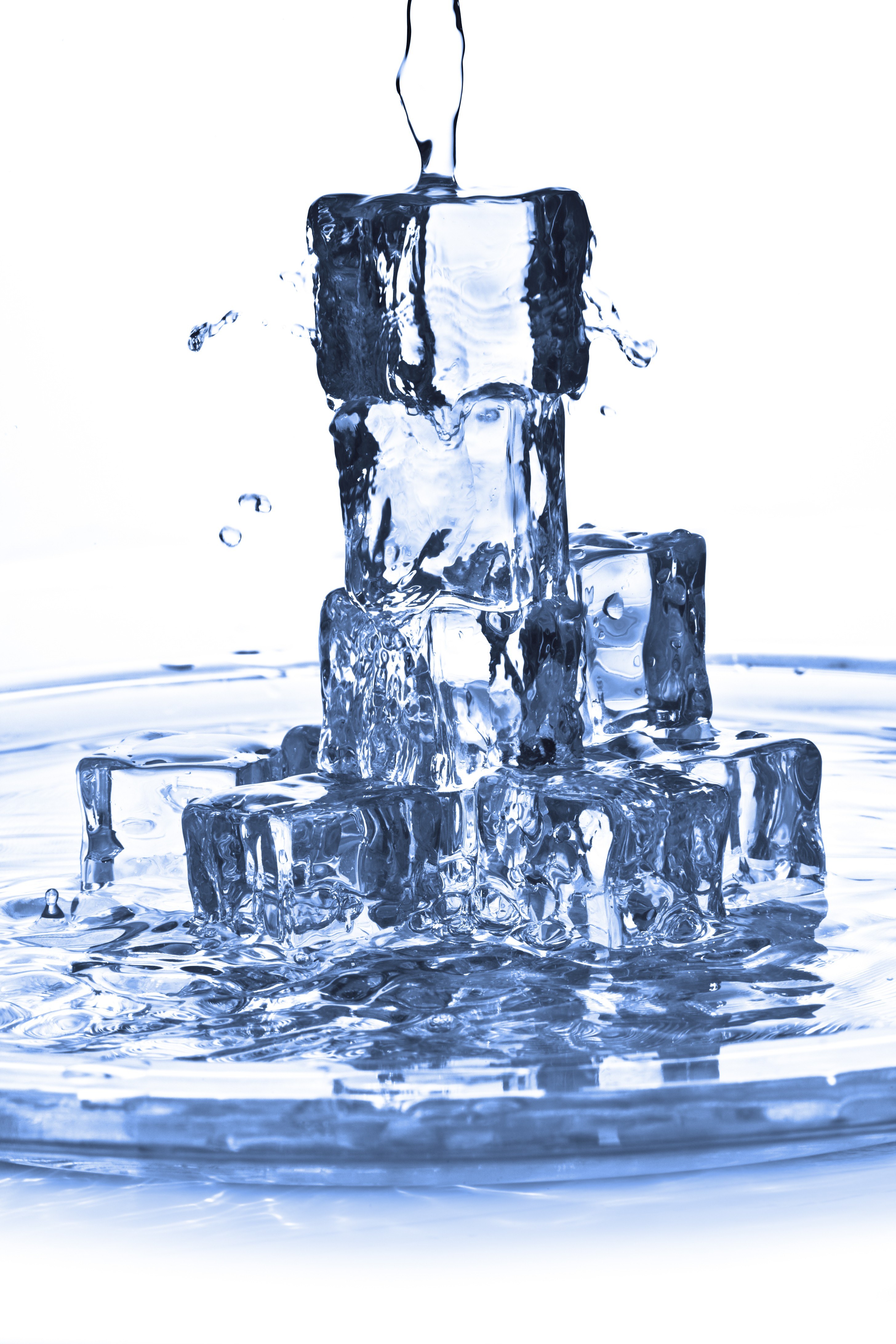 Water splashing on ice cubes
