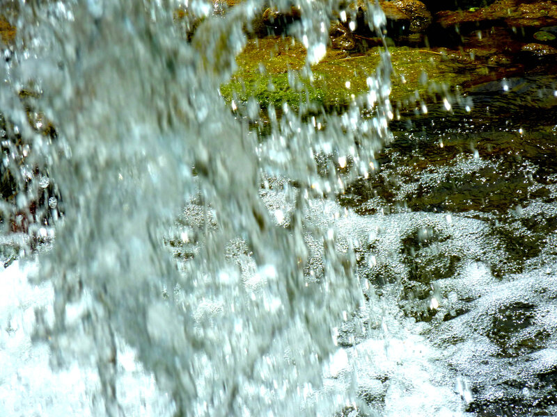 Water splashing over rocks