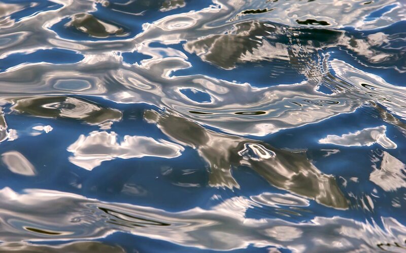 Water surface with cloud reflections